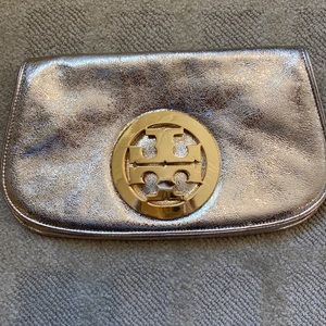 Tory Burch gold clutch